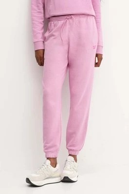 Zdjęcie produktu Reebok spodnie dresowe kolor różowy gładkie 100075640