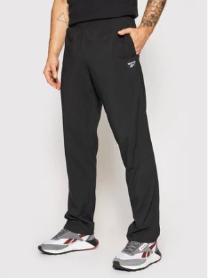 Zdjęcie produktu Reebok Spodnie dresowe Training Essentials Woven FP9170 Czarny Regular Fit