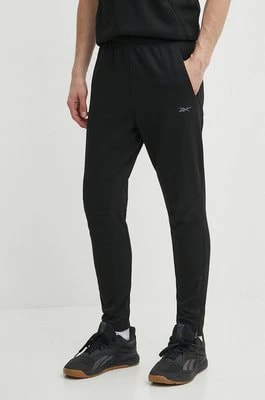 Zdjęcie produktu Reebok spodnie treningowe Strength kolor czarny gładkie 100075596