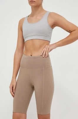 Zdjęcie produktu Reebok szorty treningowe Lux kolor beżowy gładkie high waist