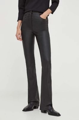 Zdjęcie produktu Remain spodnie skórzane damskie kolor czarny dzwony high waist
