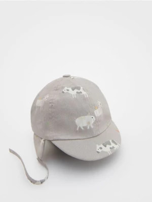 Zdjęcie produktu Reserved - Bawełniana czapka z wiązaniem - kremowy
