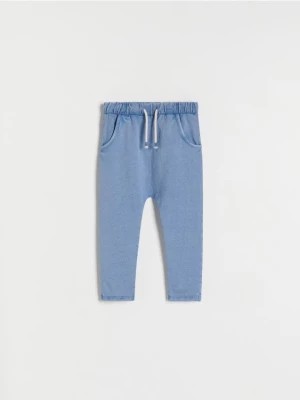Zdjęcie produktu Reserved - Dresowe spodnie z efektem sprania - niebieski