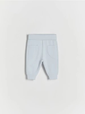 Zdjęcie produktu Reserved - Dzianinowe spodnie z kieszeniami - jasnoniebieski