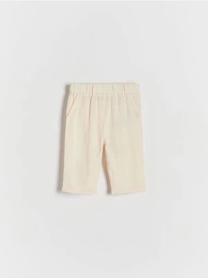 Zdjęcie produktu Reserved - Tkaninowe spodnie z lnem - kremowy