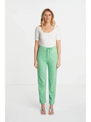 Zdjęcie produktu Rich & Royal Spodnie dresowe w kolorze zielonym rozmiar: L