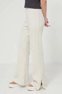 Zdjęcie produktu Rip Curl spodnie damskie kolor beżowy dopasowane high waist