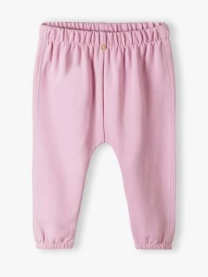 Zdjęcie produktu Różowe dzianinowe spodnie dla niemowlaka - 5.10.15.