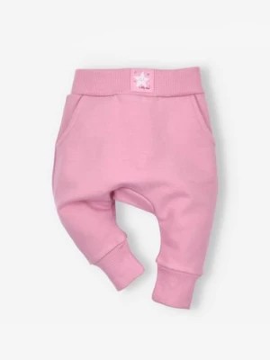 Zdjęcie produktu Różowe spodnie dresowe niemowlęce NINI