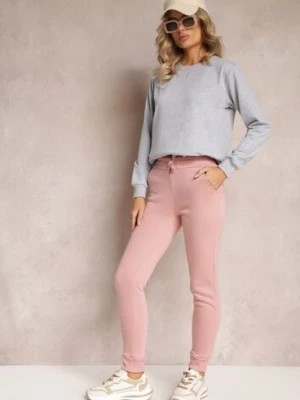 Zdjęcie produktu Różowe Spodnie Dresowe z Regularnym Stanem i Polarem Minnah