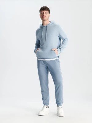 Zdjęcie produktu Sinsay - Spodnie dresowe jogger - błękitny