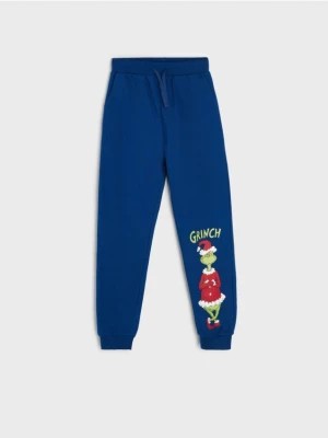 Zdjęcie produktu Sinsay - Spodnie dresowe jogger Grinch - niebieski