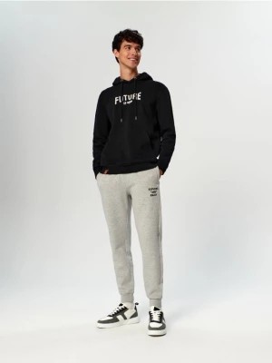 Zdjęcie produktu Sinsay - Spodnie dresowe jogger - kremowy