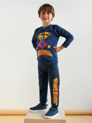 Zdjęcie produktu Sinsay - Spodnie dresowe jogger Superman - granatowy