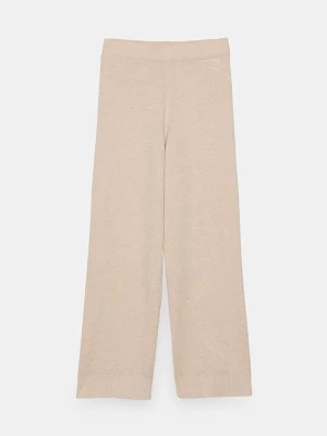 Zdjęcie produktu Someday Spodnie dzianinowe "Ciandra" w kolorze beżowym rozmiar: 42