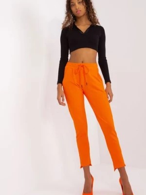 Zdjęcie produktu Spodnie basic z asymetrycznymi nogawkami pomarańczowy