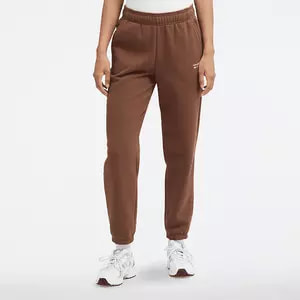 Zdjęcie produktu Spodnie damskie New Balance WP33513PNC - brązowe