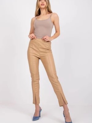 Zdjęcie produktu Spodnie damskie z eko skóry - beżowe Italy Moda