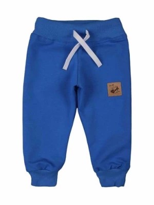Zdjęcie produktu Spodnie dresowe chłopięce niebieskie z dzianiny Tup Tup