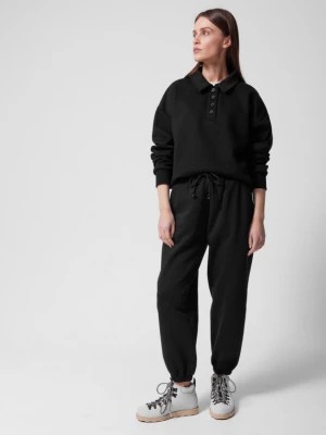 Zdjęcie produktu Spodnie dresowe joggery damskie - czarne OUTHORN