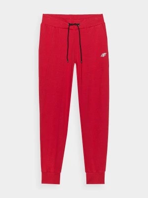 Zdjęcie produktu Spodnie dresowe joggery damskie - czerwone 4F