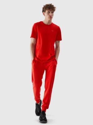 Zdjęcie produktu Spodnie dresowe joggery męskie - czerwone 4F