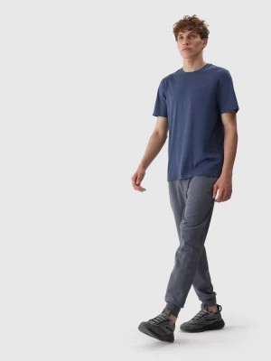 Zdjęcie produktu Spodnie dresowe joggery męskie - szare 4F