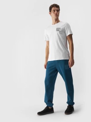 Zdjęcie produktu Spodnie dresowe joggery męskie - turkusowe 4F