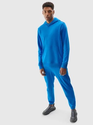 Zdjęcie produktu Spodnie dresowe joggery z bawełną organiczną męskie - niebieskie 4F