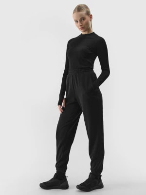 Zdjęcie produktu Spodnie dresowe joggery z dodatkiem modalu damskie - czarne 4F