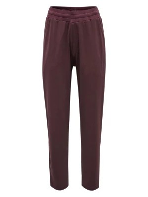 Zdjęcie produktu Hummel Spodnie dresowe "Luise" w kolorze czerwono-fioletowym rozmiar: S
