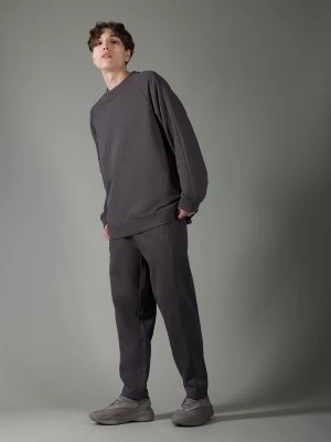 Zdjęcie produktu Spodnie dresowe męskie 4F x Robert Lewandowski