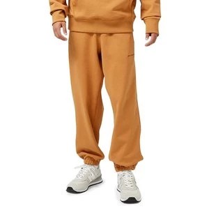 Zdjęcie produktu Spodnie dresowe New Balance MP23551TOB - pomarańczowe