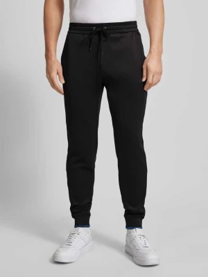 Zdjęcie produktu Spodnie dresowe o kroju regular fit z paskami w kontrastowym kolorze Michael Kors