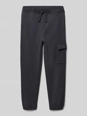 Zdjęcie produktu Spodnie dresowe o luźnym kroju z kieszenią cargo Tom Tailor