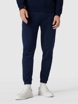 Zdjęcie produktu Spodnie dresowe z detalem z logo Lacoste