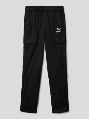 Zdjęcie produktu Spodnie dresowe z kieszeniami z patką model ‘CLASSICS Woven Pants’ Puma