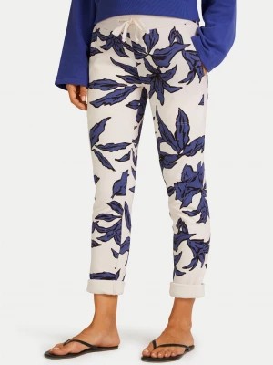 Zdjęcie produktu Spodnie dresowe z nadrukiem lilii Juvia