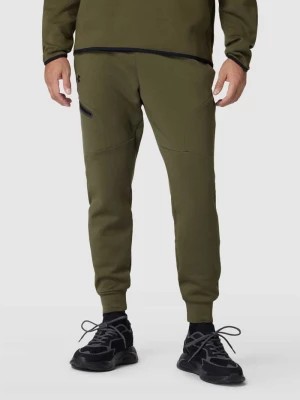 Zdjęcie produktu Spodnie dresowe z nadrukiem z logo Under Armour