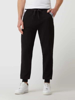 Zdjęcie produktu Spodnie dresowe z paskiem z logo Moschino Swim + Underwear