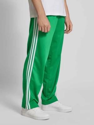 Zdjęcie produktu Spodnie dresowe z wyhaftowanym logo adidas Originals