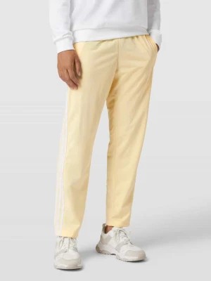 Zdjęcie produktu Spodnie dresowe z wyhaftowanym logo model ‘STRAIGHT’ adidas Originals