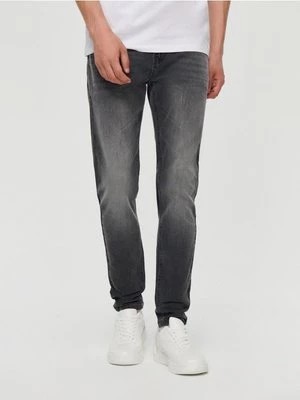 Zdjęcie produktu Spodnie jeansowe slim fit grafitowe House