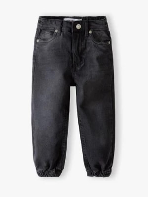Zdjęcie produktu Spodnie jeansowe typu joggery dziewczęce czarne Minoti