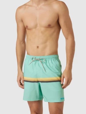 Zdjęcie produktu Spodnie kąpielowe z paskami w kontrastowym kolorze Rip Curl
