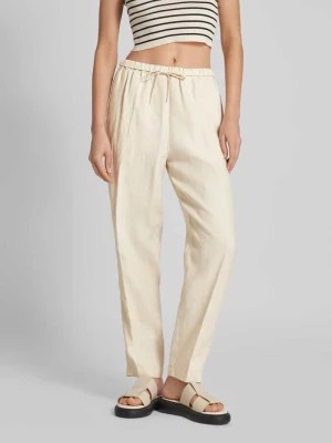 Zdjęcie produktu Spodnie lniane o kroju tapered fit w kant model ‘CASUAL LINEN’ Tommy Hilfiger