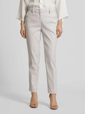 Zdjęcie produktu Spodnie materiałowe o kroju slim fit z wzorem na całej powierzchni MORE & MORE