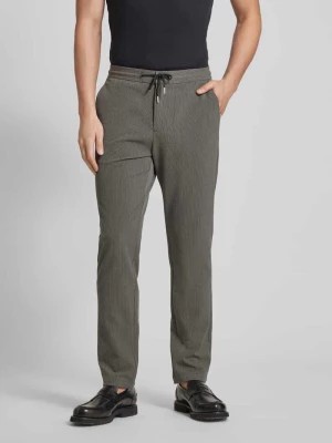 Zdjęcie produktu Spodnie materiałowe o kroju tapered fit z delikatnie fakturowanym wzorem lindbergh