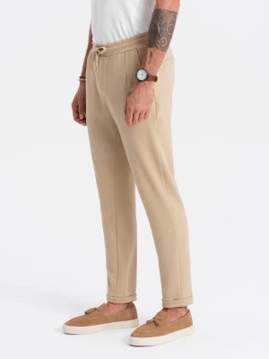 Zdjęcie produktu Spodnie męskie dzianinowe z gumką w pasie - piaskowe V3 OM-PACP-0121
 -                                    L