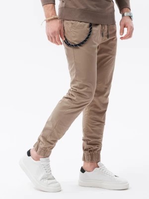 Zdjęcie produktu Spodnie męskie materiałowe JOGGERY z ozdobnym sznurkiem - beżowe V5 P908
 -                                    XL